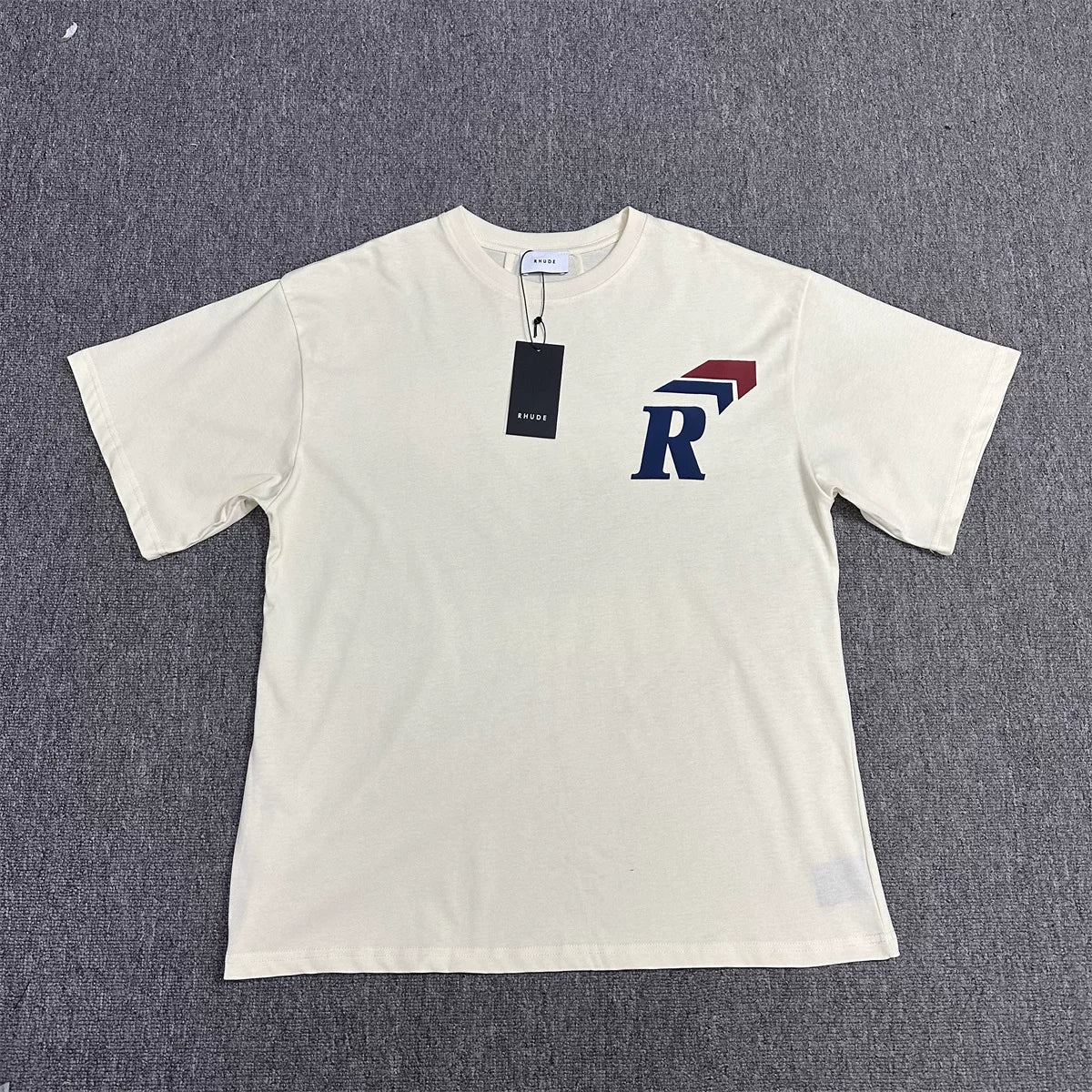 Rhude 3D R Logo Chest Graphic Tee Cream